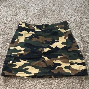 Jean material, army pattern mini skirt.